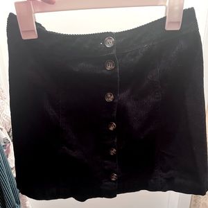 Black button up H&M skirt. Only worn a few times.